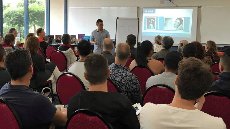 Andrew Low leading a live coaching session with professionals learning about building soul-aligned businesses.